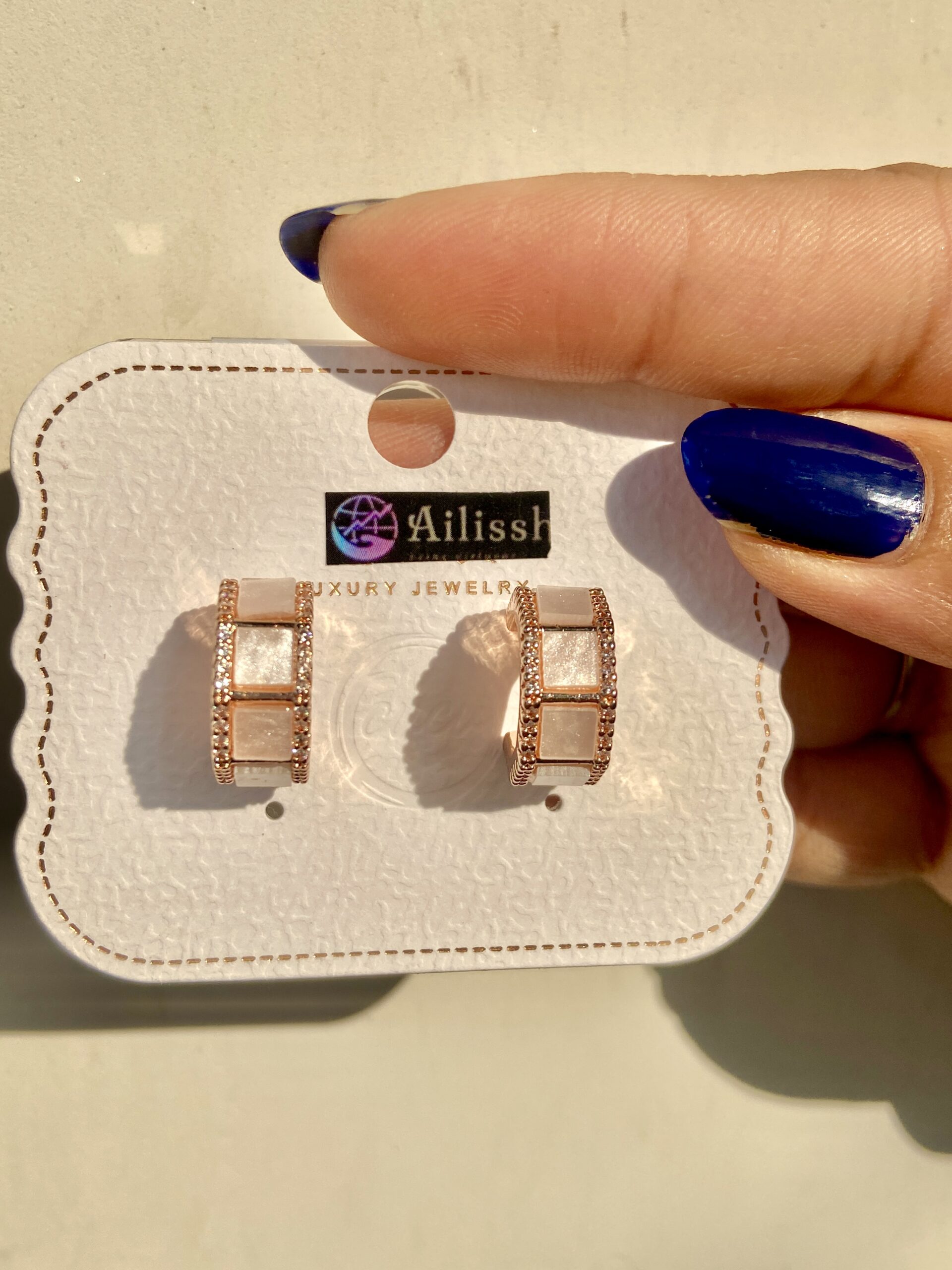 Golden C-shaped zircon studs